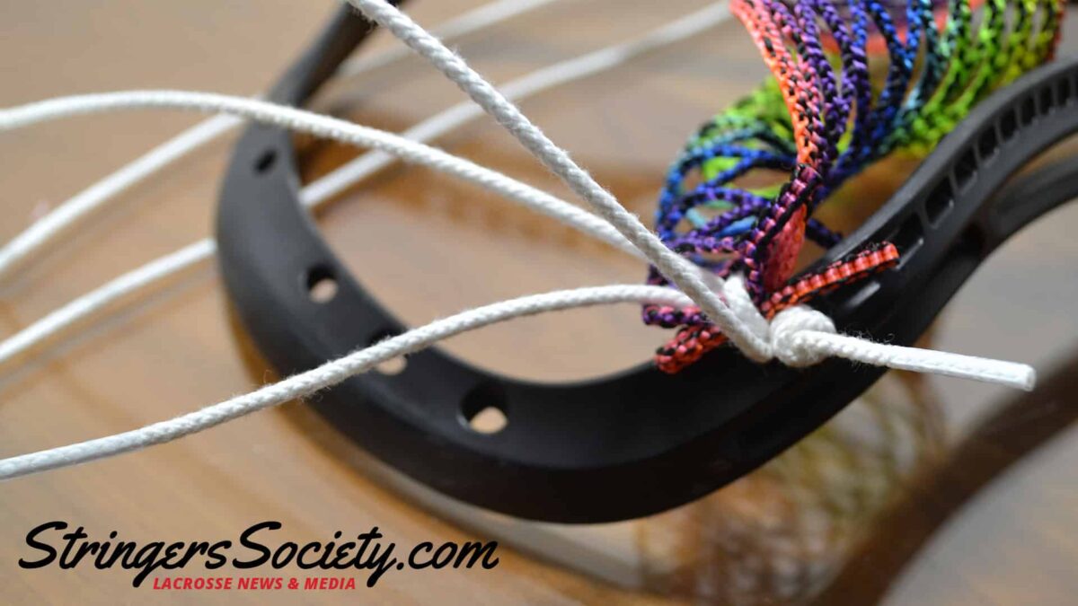 How to String a Women's Lacrosse Head attaching mesh to sidewall
