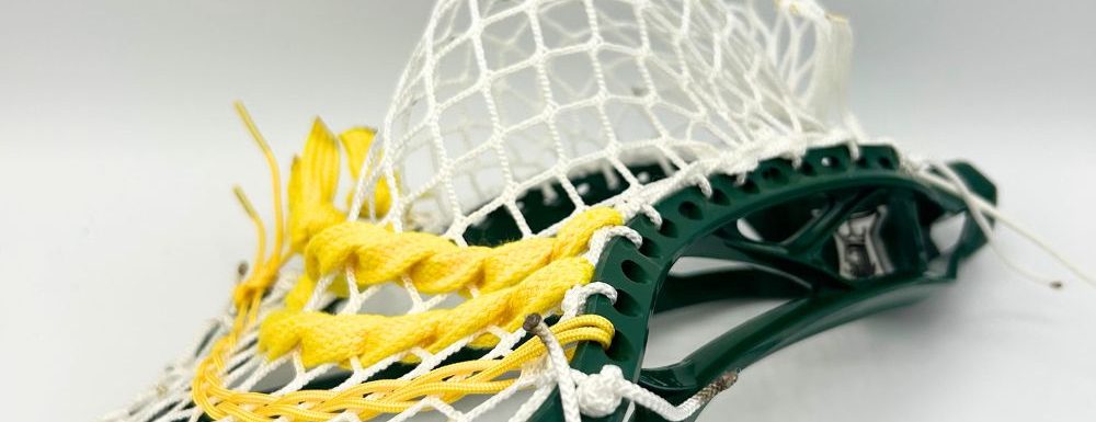 close-up of a vintage brine clutch lacrosse head strung with stringers shack g3 xl lacrosse mesh in a mid-pocket using a classic stringing pattern