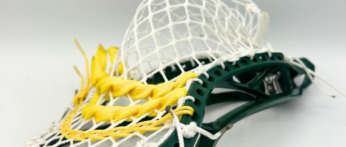close-up of a vintage brine clutch lacrosse head strung with stringers shack g3 xl lacrosse mesh in a mid-pocket using a classic stringing pattern