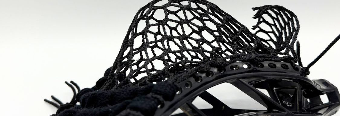 Black lacrosse head with mesh pocket