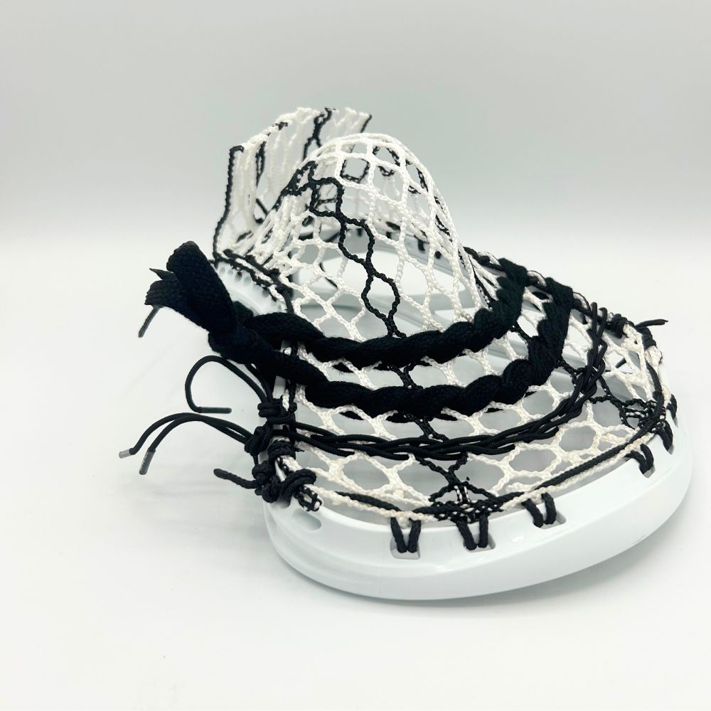 ECD DNA 2.0 lacrosse head strung with Hero 3.0 Semi-Soft mesh in a mid-pocket configuration.