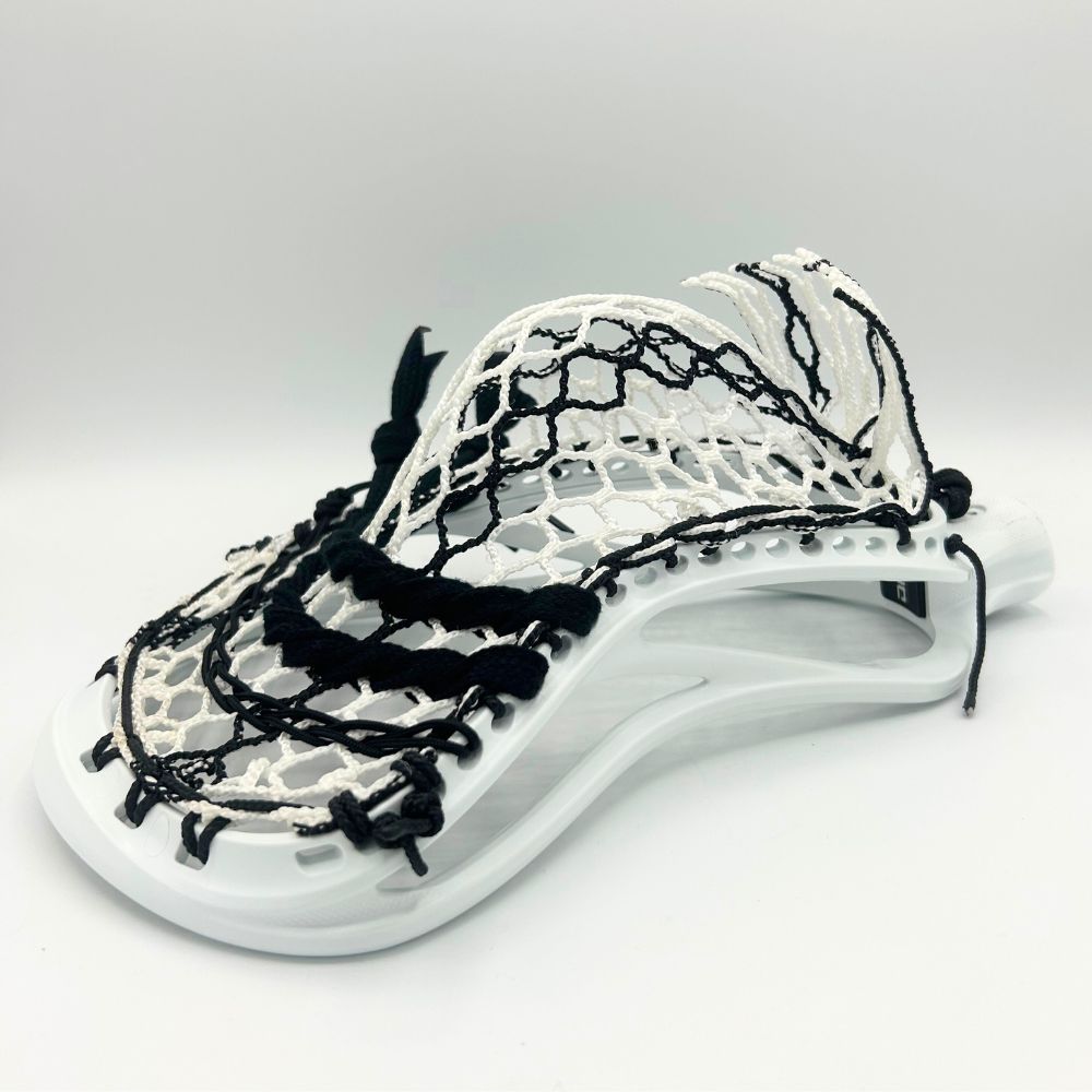 ECD DNA 2.0 lacrosse head strung with Hero 3.0 Semi-Soft mesh in a mid-pocket configuration.