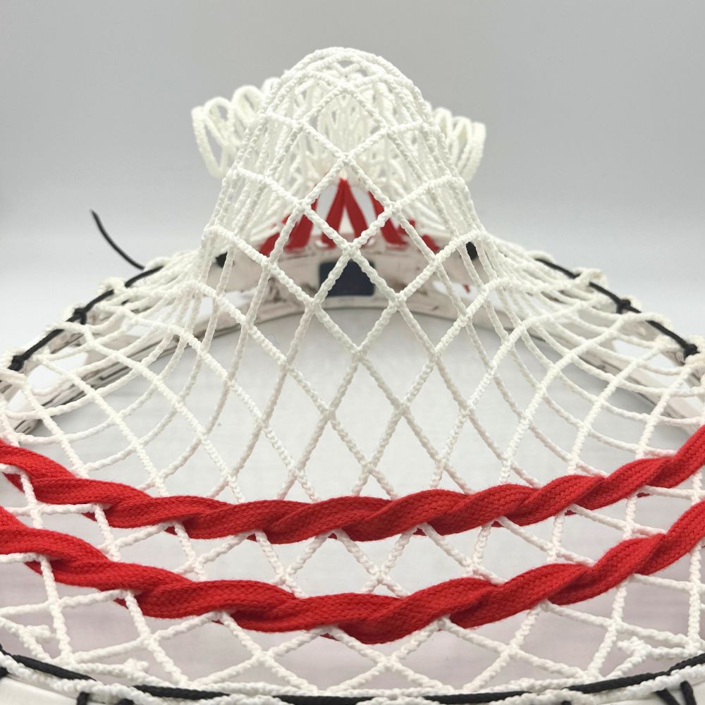 ECD Impact goalie head strung with wide, deep baggy pocket using semi-soft Impact mesh