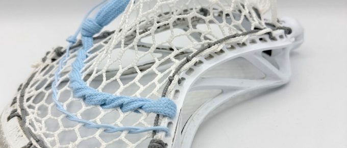 Lacrosse stick with unique stringing design.