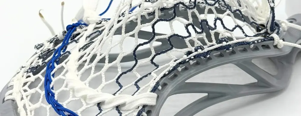Lacrosse stick with intricate stringing