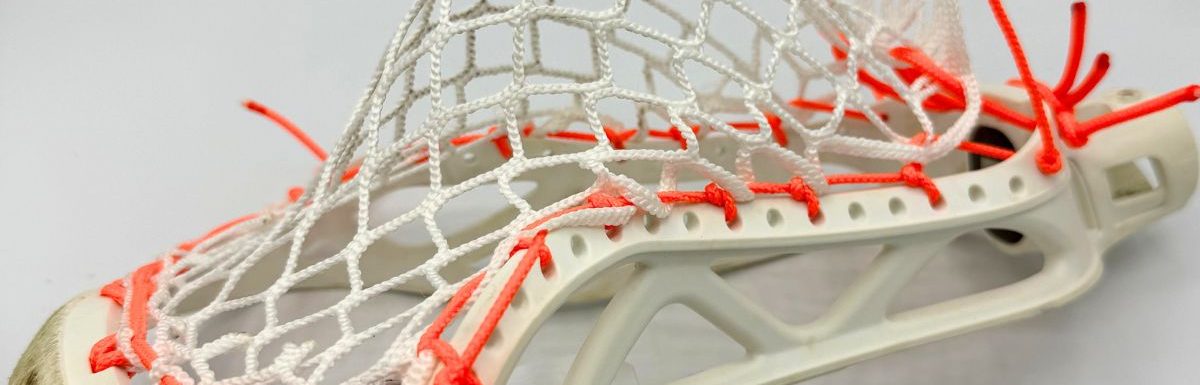 side view of epoch hawk laid-back sidewall strung with laxroom 8-diamond mesh and neon orange sidewall