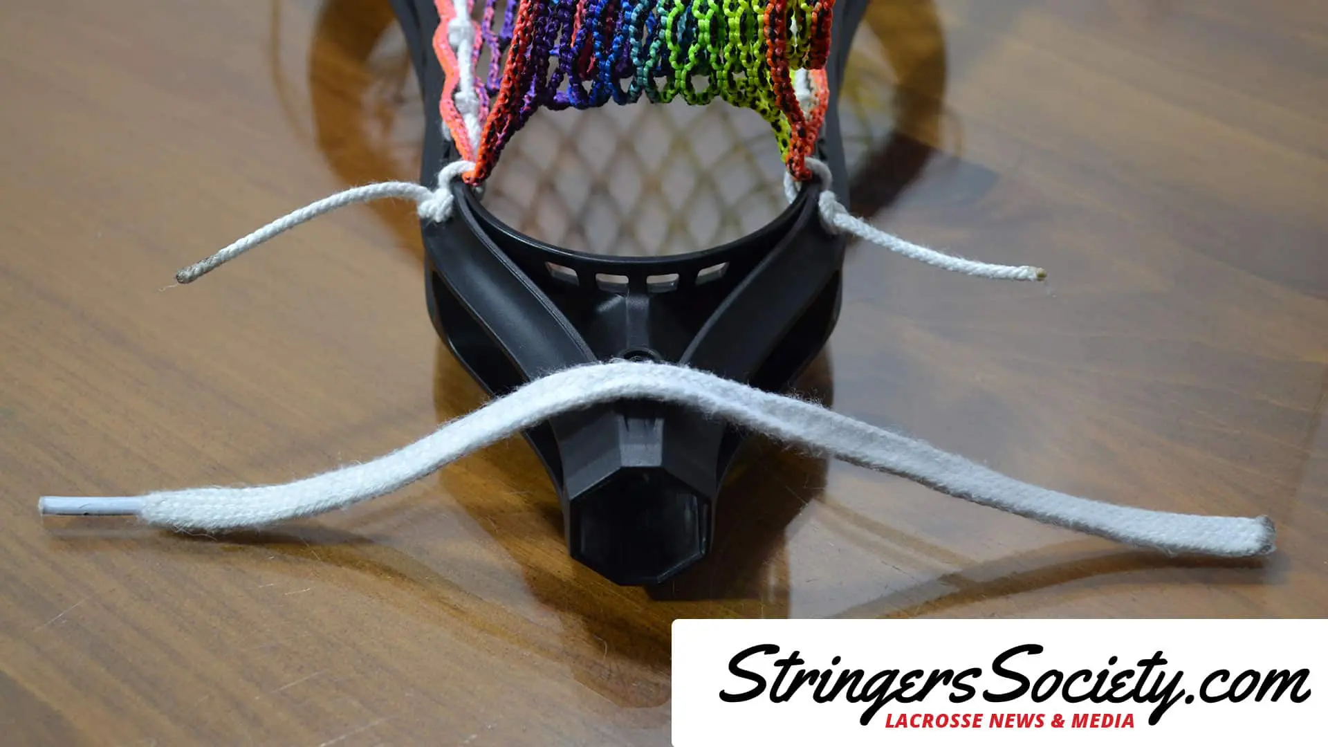 how to string a womens lacrosse head bottom string