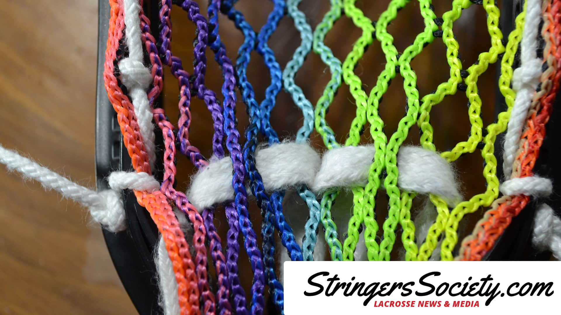 How to String a Women's Lacrosse Head how to string bottom string lacrosse step 4
