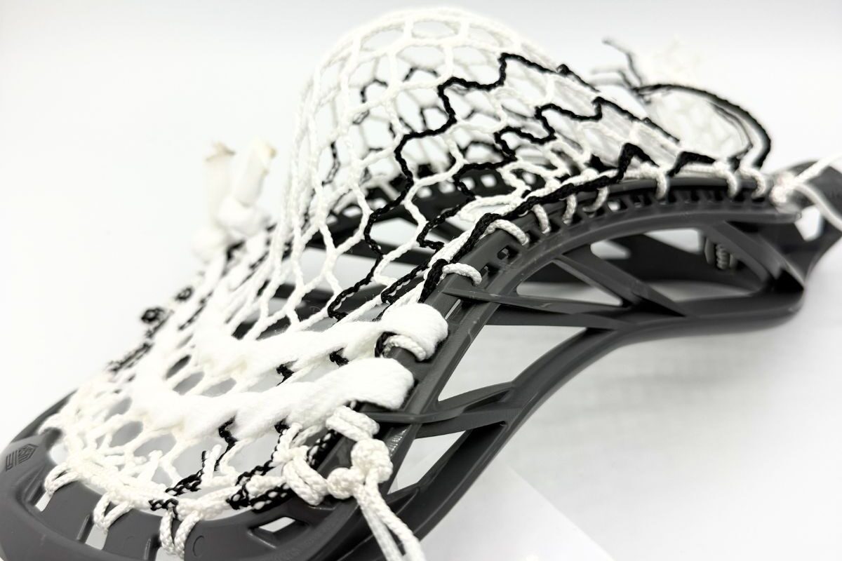 Custom strung Maverik Havok 2.0 lacrosse head featuring a mid-high pocket with Hero 4.0 semi-soft mesh.