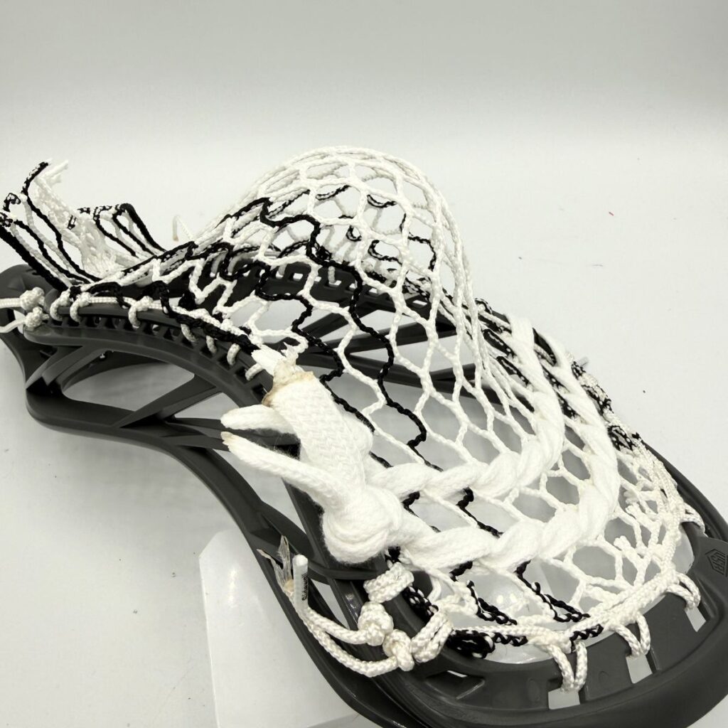 Custom strung Maverik Havok 2.0 lacrosse head featuring a mid-high pocket with Hero 4.0 semi-soft mesh.