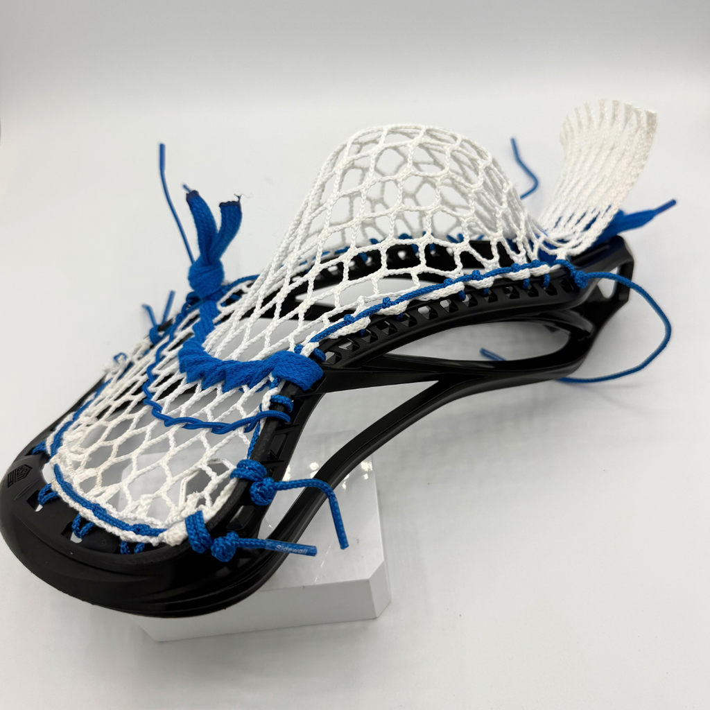 side profile of a maverik kinetik 3.0 low pocket with royal blue sidewall and stringking type 5s mesh