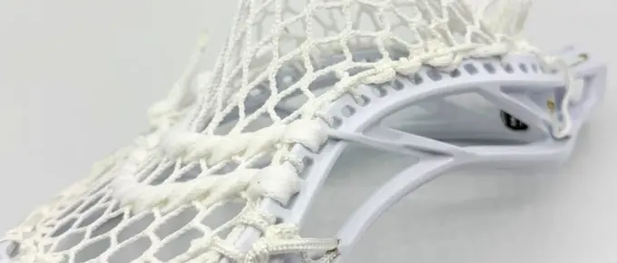 White lacrosse head with mesh