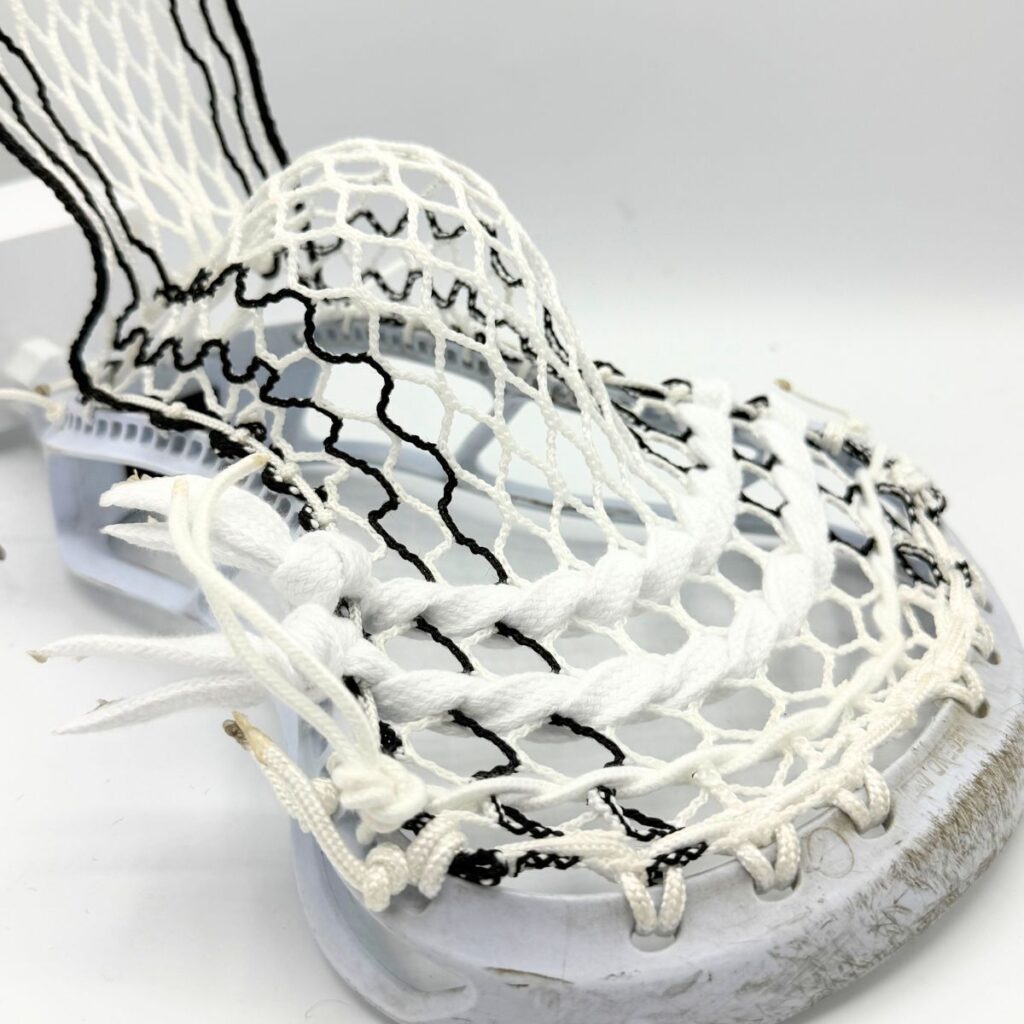 StringKing Legend Intermediate lacrosse head with Hero 4.0 Semi-Soft mesh mid-pocket, optimized for middle school midfielders and youth players