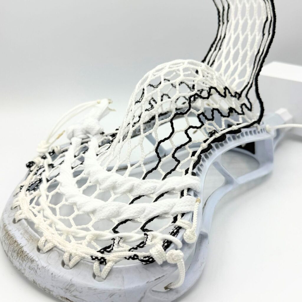StringKing Legend Intermediate lacrosse head with Hero 4.0 Semi-Soft mesh mid-pocket, optimized for middle school midfielders and youth players