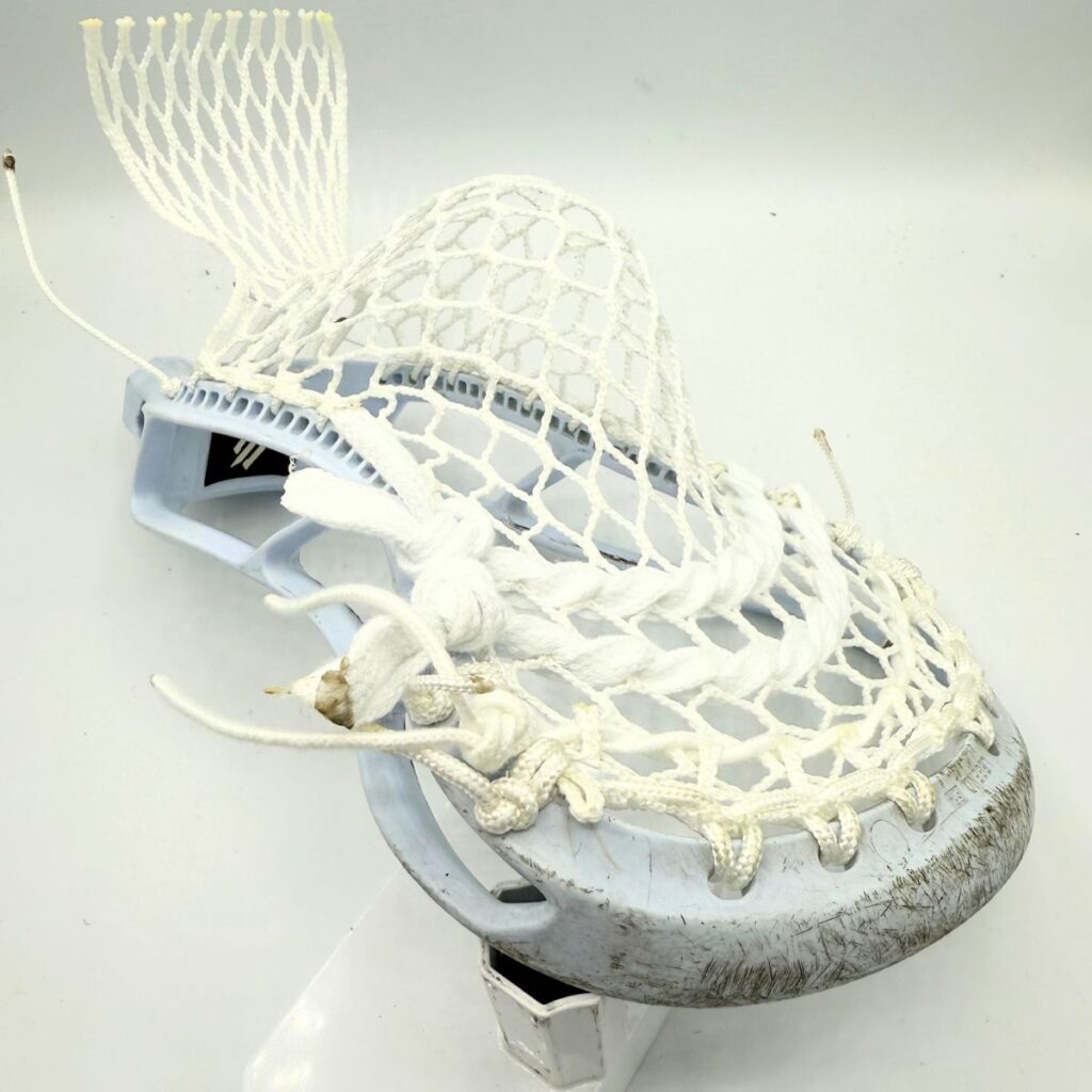 StringKing Legend Senior strung with ECD Hero 4.0 Semi-Soft mesh, showing the stiff sidewall and narrow face shape