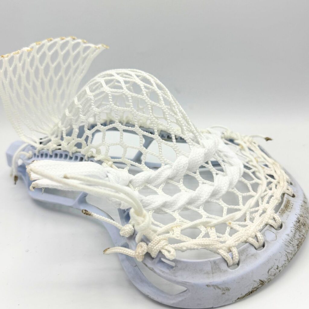StringKing Legend Intermediate head with budget Stringers Shack G3 10D mesh mid-pocket for youth midfielders.