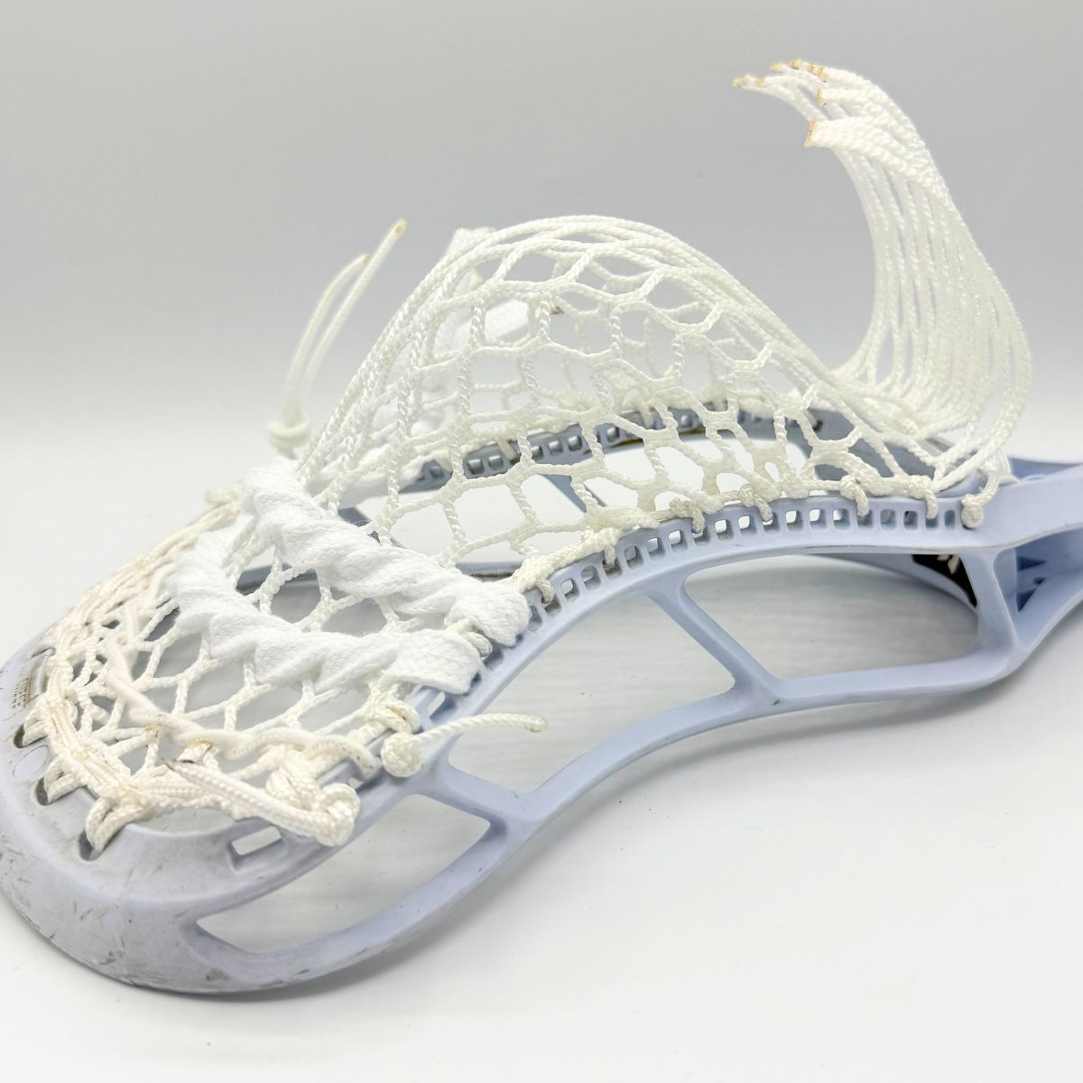 StringKing Legend Intermediate head with budget Stringers Shack G3 10D mesh mid-pocket for youth midfielders.