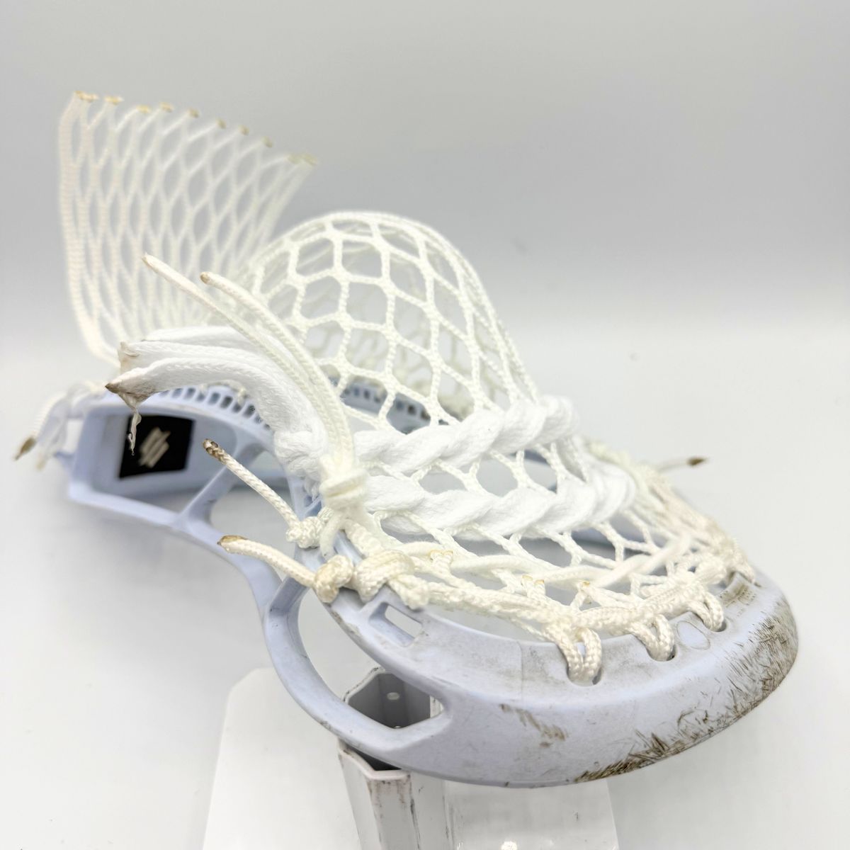 StringKing Legend Intermediate head with budget Stringers Shack G3 10D mesh mid-pocket for youth midfielders.