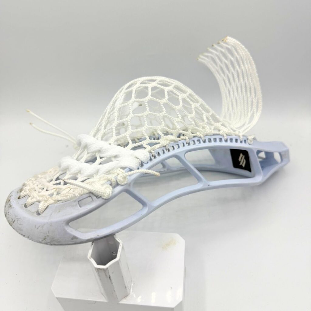 StringKing Legend Intermediate head with budget Stringers Shack G3 10D mesh mid-pocket for youth midfielders.