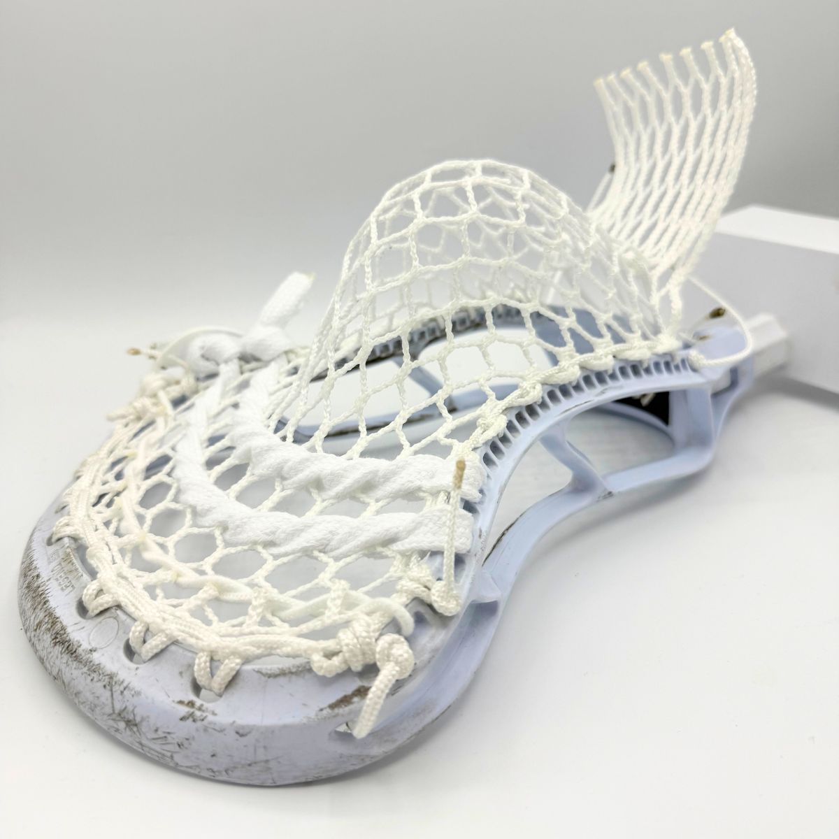 StringKing Legend Senior strung with ECD Hero 4.0 Semi-Soft mesh, showing the stiff sidewall and narrow face shape