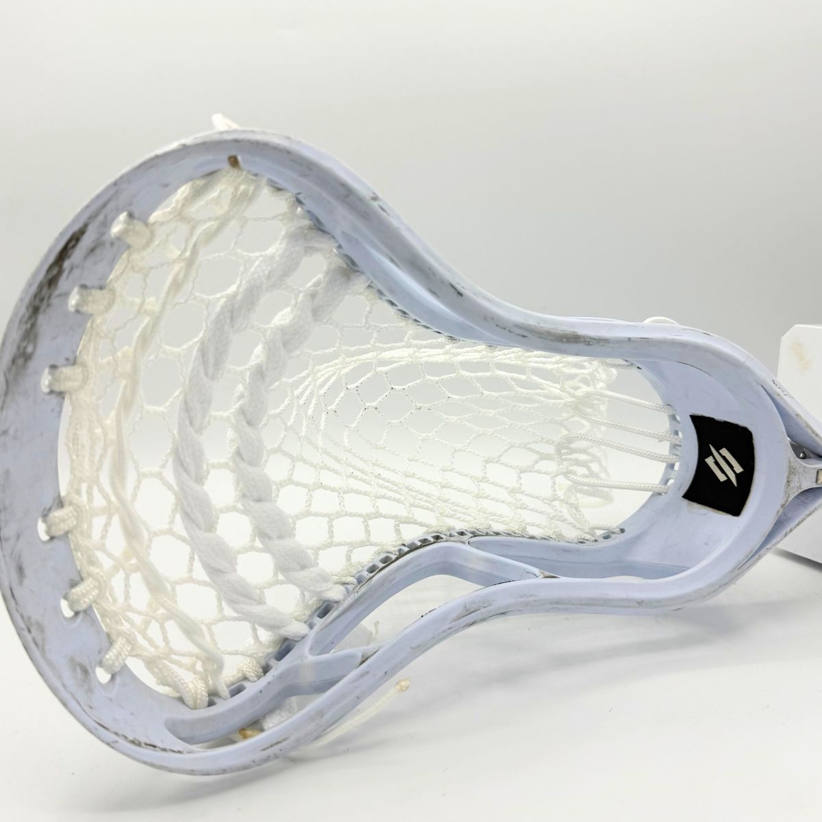 StringKing Legend Senior strung with ECD Hero 4.0 Semi-Soft mesh, showing the stiff sidewall and narrow face shape