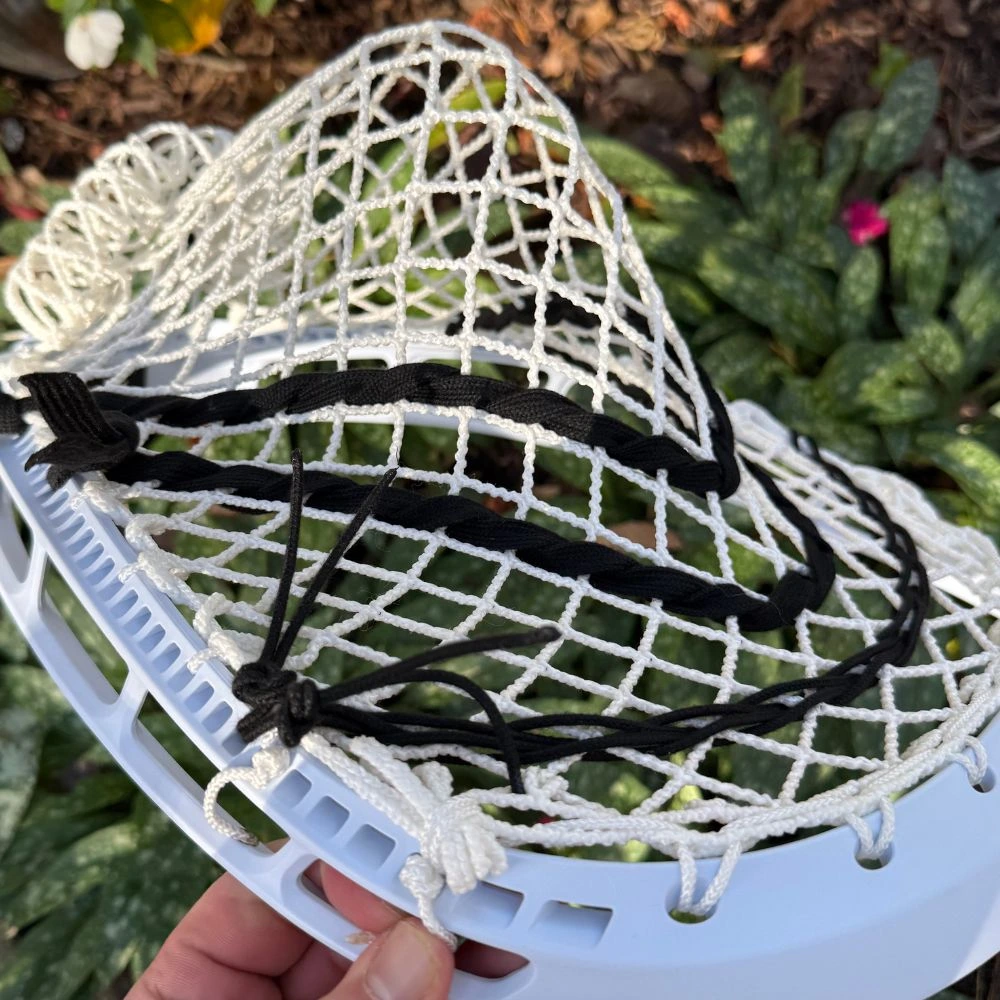 detailed shot of top string and sidewall knots on goalie head