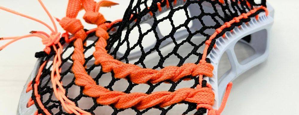 stringking mark 2v hero 3 lacrosse head strung with a mid-pocket pattern.