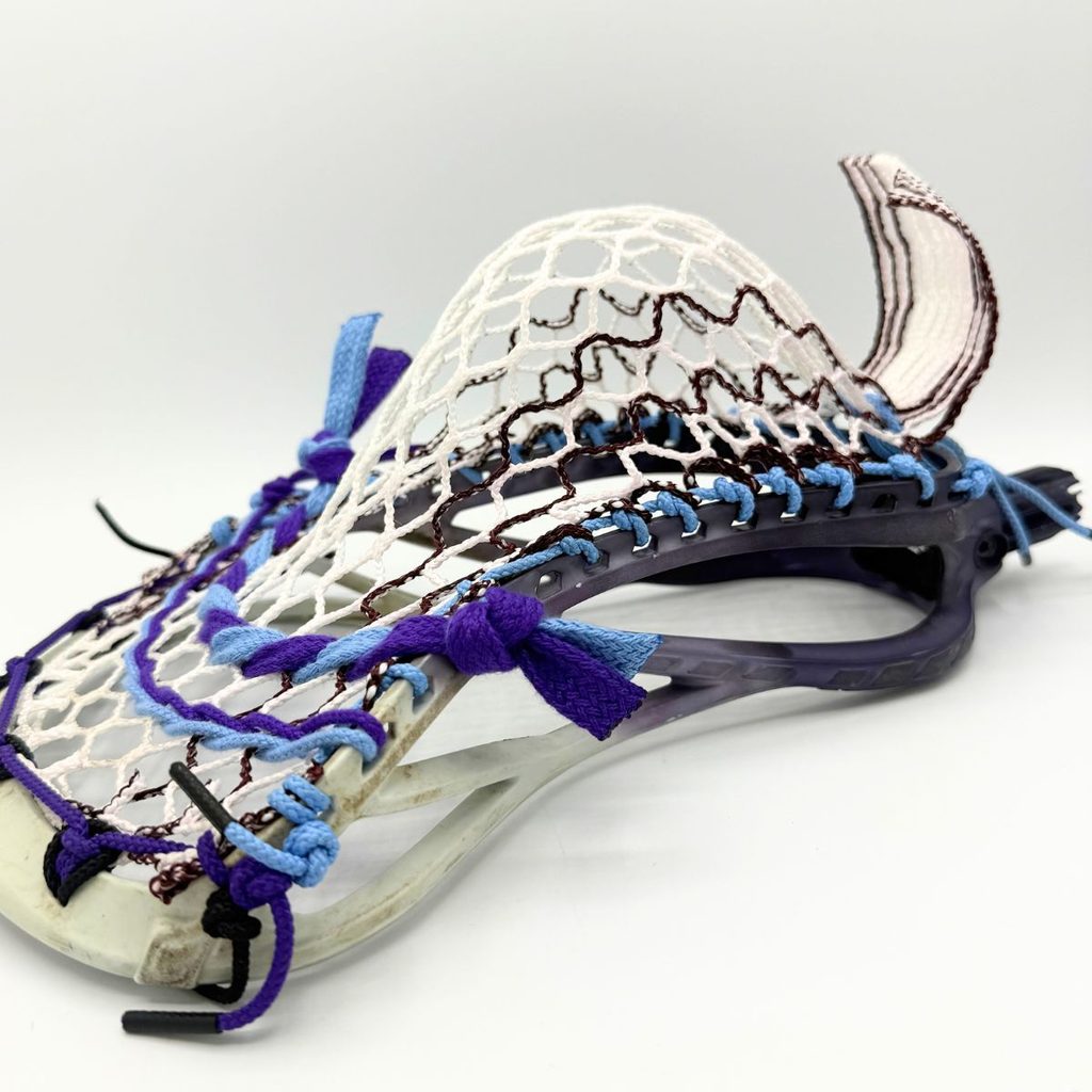 stx duel iii low pocket strung with white and maroon hero 4.0 semisoft mesh, side view