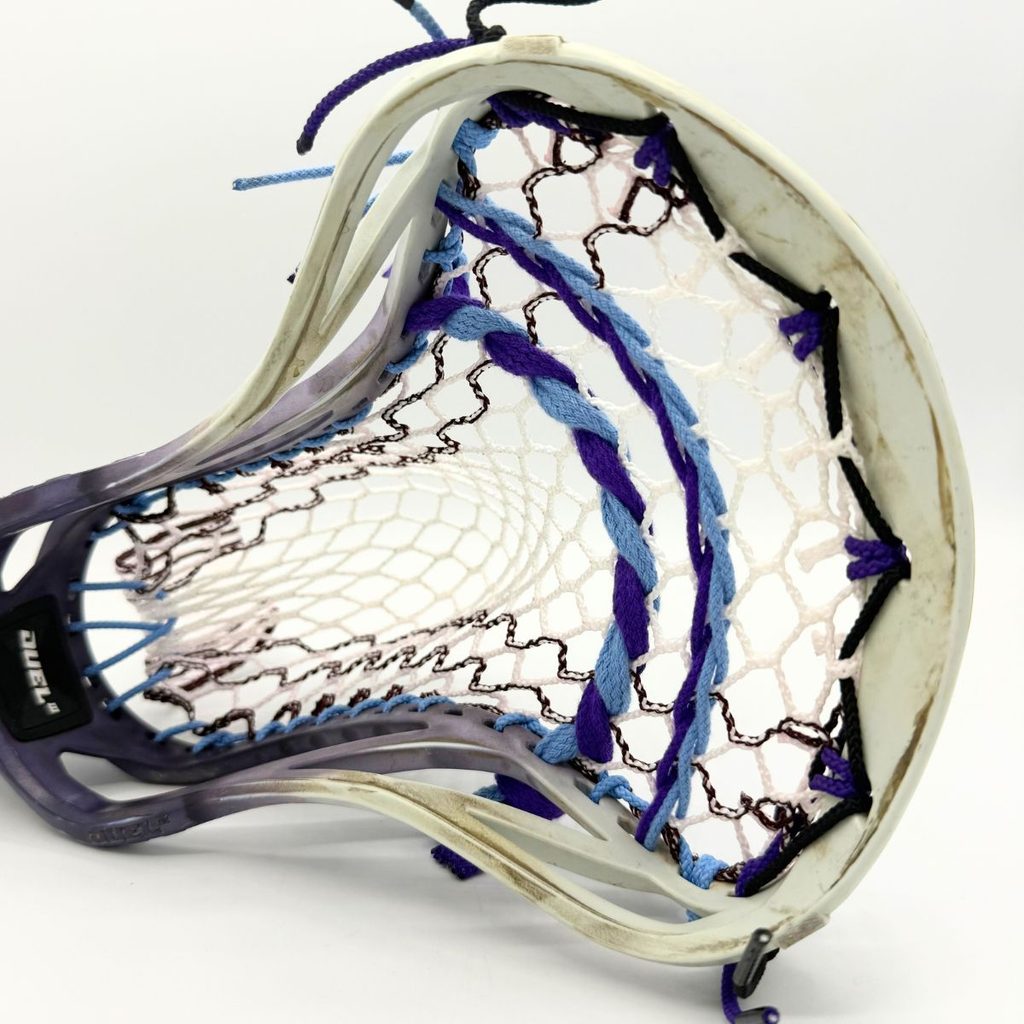 face view of an stx duel iii with hero 4.0 mesh and purple and carolina blue shooting strings