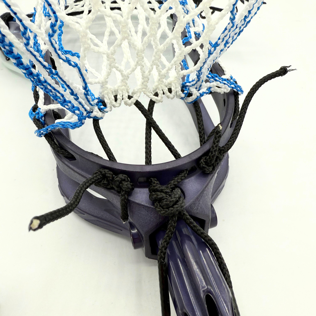 bottom string tieoff at the throat of an stx duel iii strung with hero 4.0 mesh