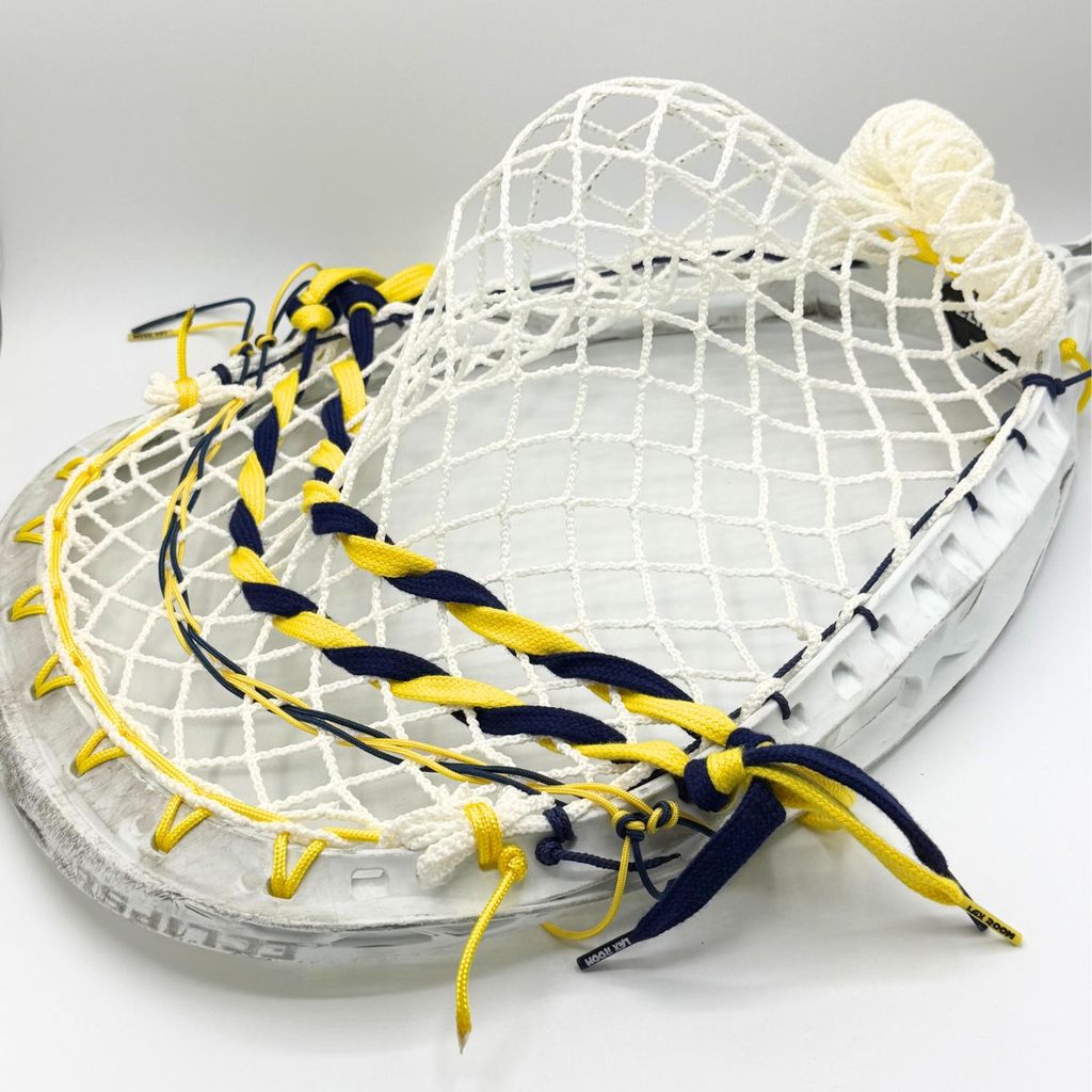 stx eclipse ii goalie stringing pattern with ecd impact 12d semisoft mesh, yellow sidewall, navy and yellow nylons and laxroom lace shooters