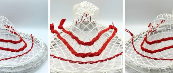 stx eclipse 3 lacrosse goalie head strung with white stringers shack g3 12d mesh, red shooting strings from laxroom, and red stringers shack bottom string and nylon.