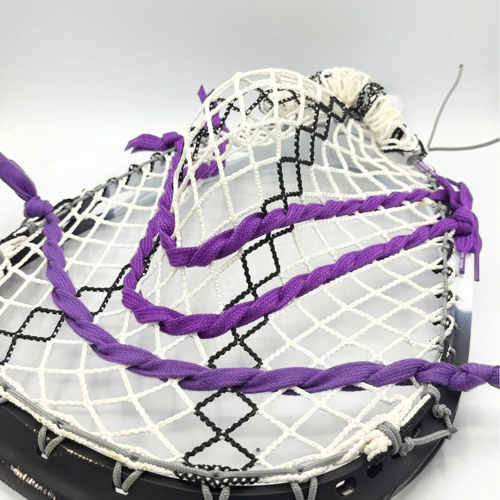 stx eclipse iii goalie head with ecd impact mesh, custom-strung with grey stringers shack top and bottom strings, grey laxroom sidewalls, and purple shooters