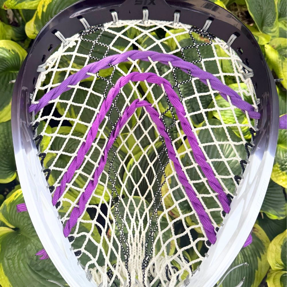 stx eclipse iii goalie head with ecd impact mesh, custom-strung with grey stringers shack top and bottom strings, grey laxroom sidewalls, and purple shooters