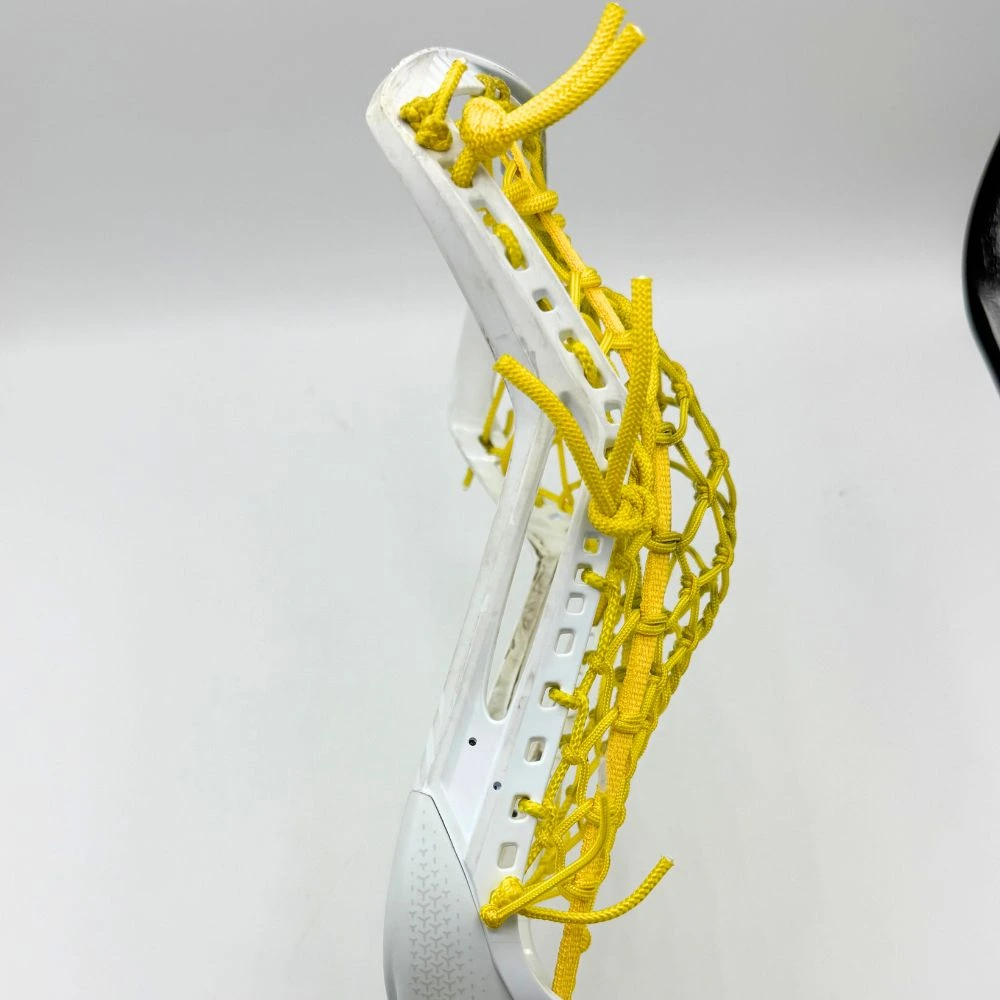 stx fuse with a broken in all yellow lock lacrosse pocket - pocket view