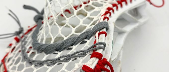 Lacrosse stick with custom mesh pocket