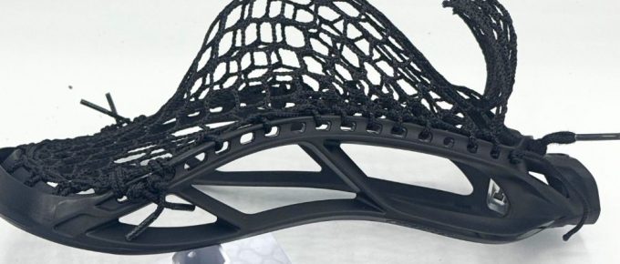 Black lacrosse head with mesh pocket