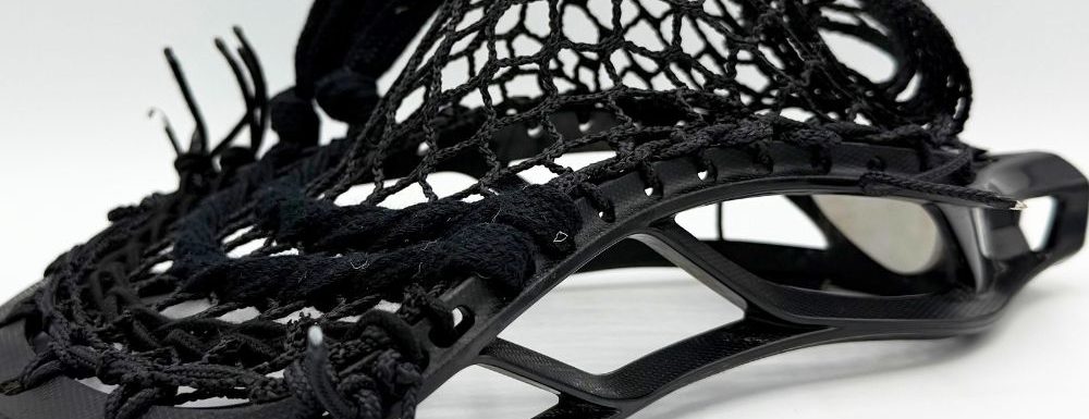 Black lacrosse head with netting