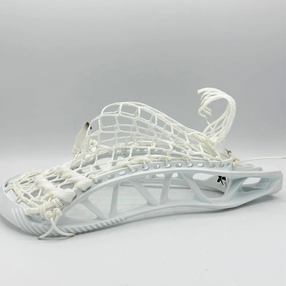 Right sidewall of white STX X20 head with mid-high 8 diamond stringing pattern