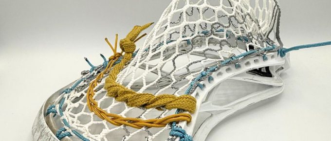 Lacrosse stick with intricate stringing