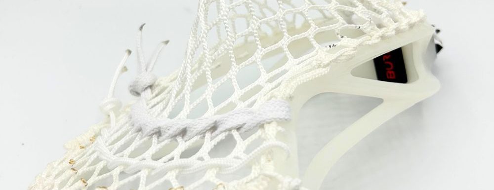 warrior burn fo lacrosse head side view with powell frontier mesh