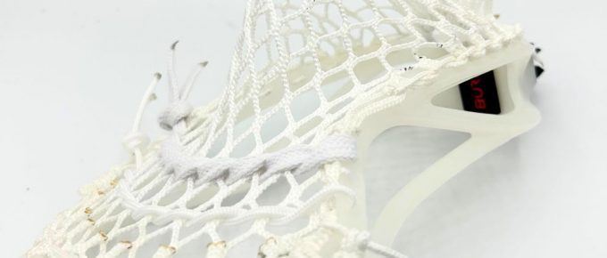 warrior burn fo lacrosse head side view with powell frontier mesh