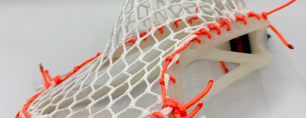 Lacrosse head with custom stringing