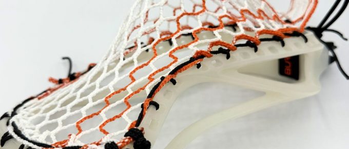 Lacrosse head with custom stringing design.