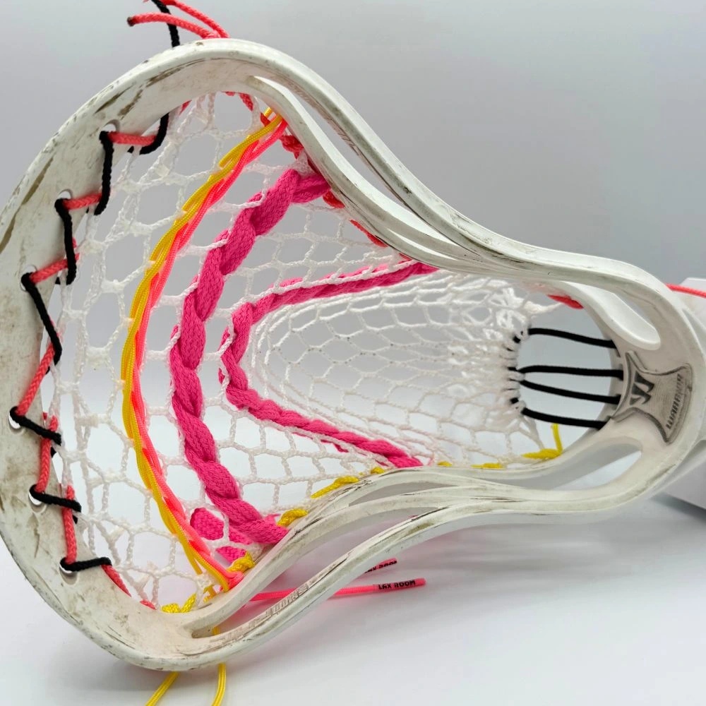 warrior evo 4x lacrosse head strung with hero 4.0 semi-soft mesh and liberty topstring featuring a mid pocket for control and release.