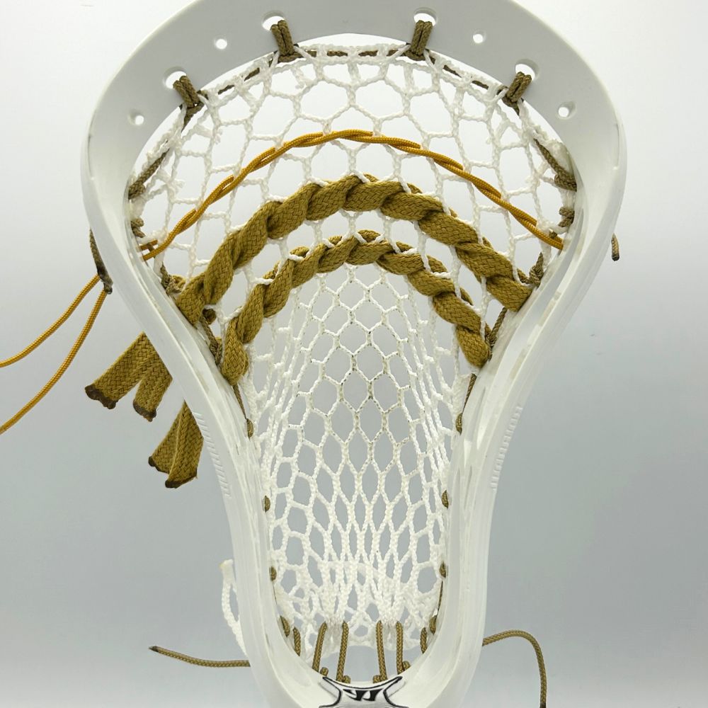 lacrosse stick head strung with mid pocket, suitable for all skill levels and versatile playing styles. lacrosse head is warrior evolyte unstrung ($50). mesh is ecd hero 3.0 semi-hard ($24.99). sidewall is laxroom vegas gold lacrosse sidewall (3-pack) ($1.14). shooters are laxroom vegas gold shooters ($1.82). shooting cord is laxroom lacrosse shooting cord (vegas gold) ($1.00). total cost is $98.95