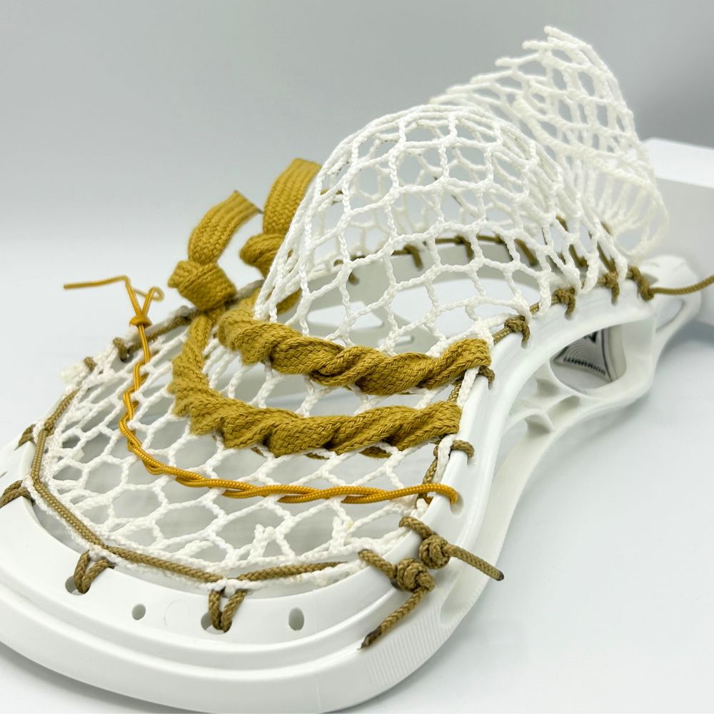 lacrosse stick head strung with mid pocket, suitable for all skill levels and versatile playing styles. lacrosse head is warrior evolyte unstrung ($50). mesh is ecd hero 3.0 semi-hard ($24.99). sidewall is laxroom vegas gold lacrosse sidewall (3-pack) ($1.14). shooters are laxroom vegas gold shooters ($1.82). shooting cord is laxroom lacrosse shooting cord (vegas gold) ($1.00). total cost is $98.95