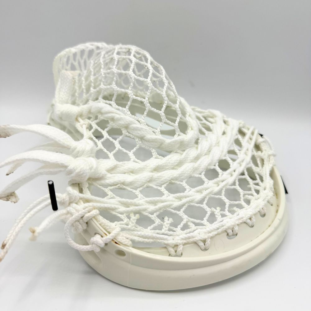 warrior revo pro lacrosse head with mid pocket and hero 3.0 semi-soft mesh