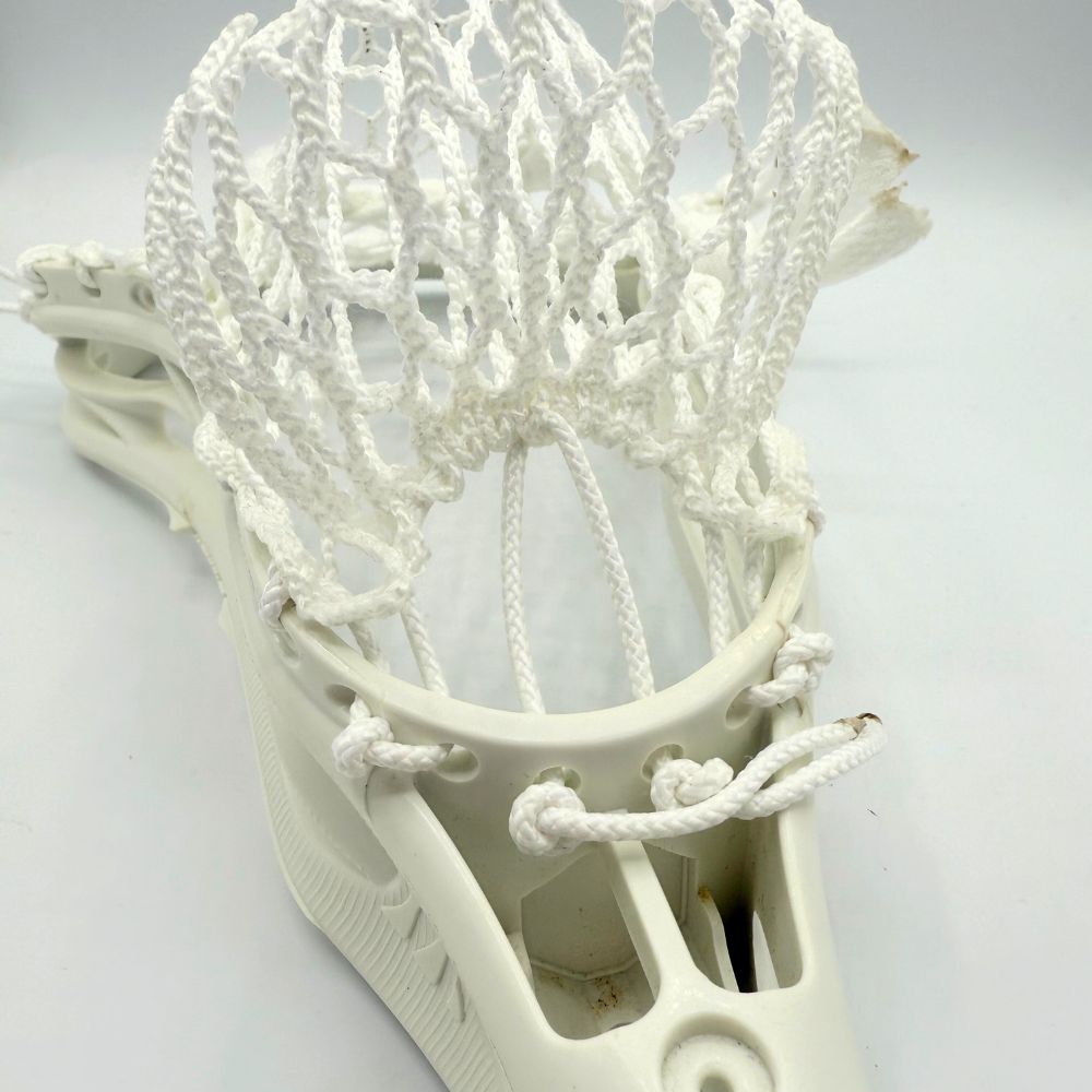 warrior revo pro lacrosse head with mid pocket and hero 3.0 semi-soft mesh