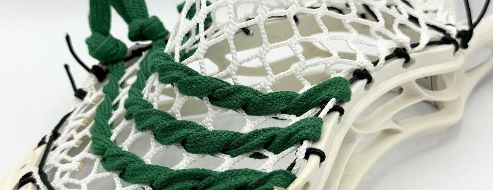 Lacrosse stick with custom stringing design.
